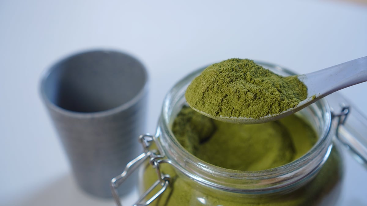 Moringa Oleifera powder in glass jar