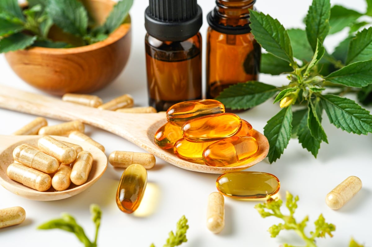 Alternative medicine herbal organic capsule vitamin E omega 3 fish oil drug herbs leaf natural