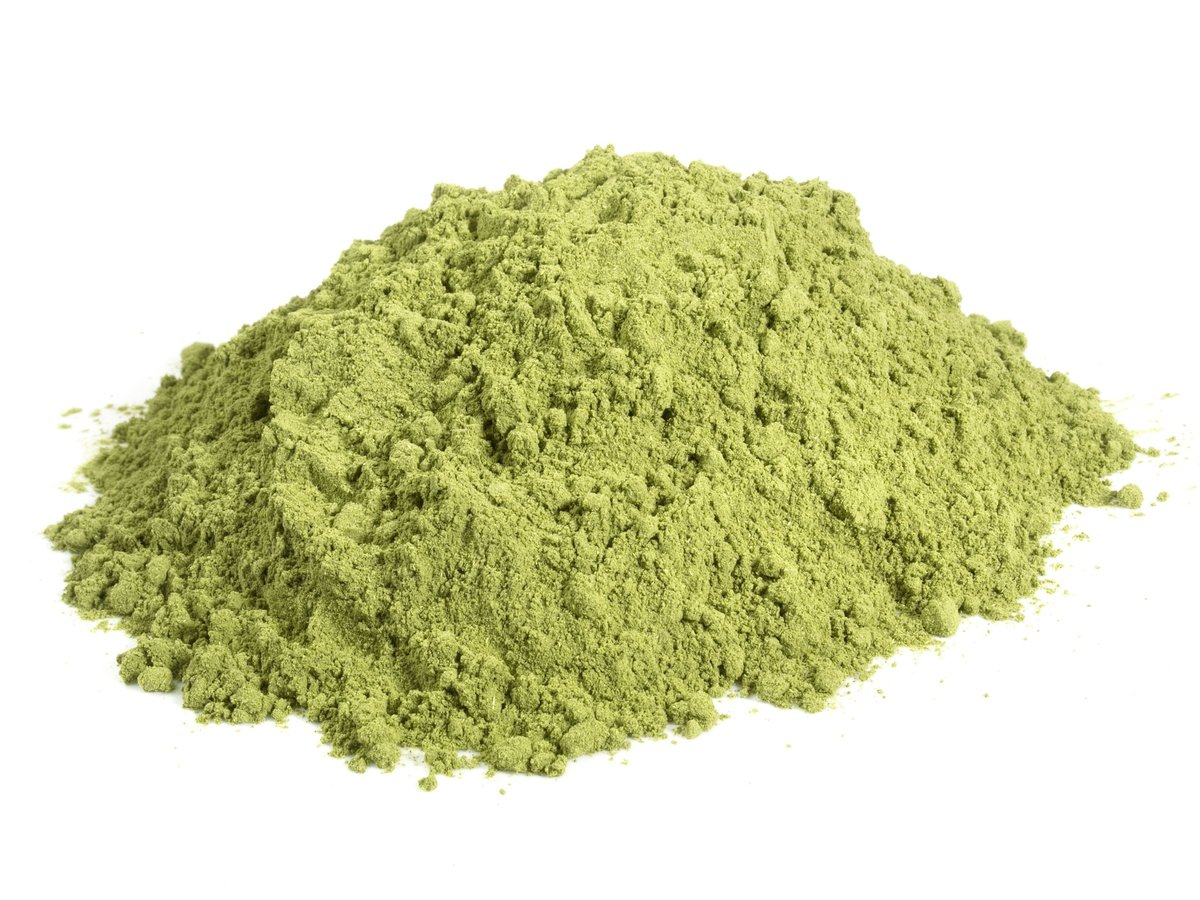 Food and Health - Moringa Powder on white Background