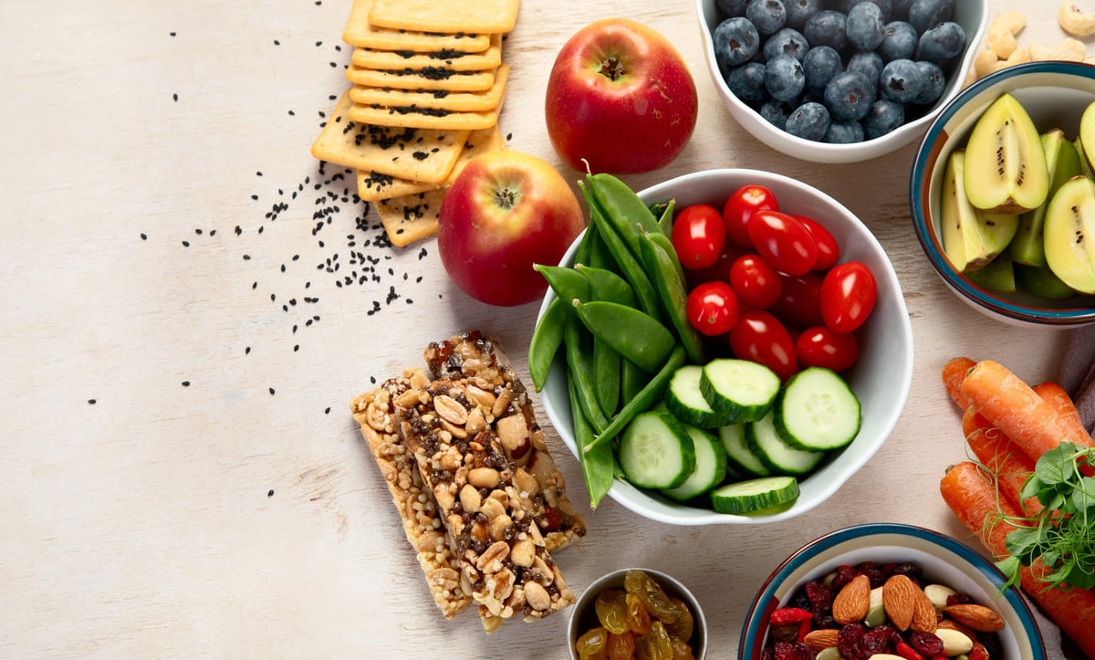 Healthy balanced dieting concept. Selection of rich fiber sources vegan food. Vegetables, fruits, seeds and nuts.